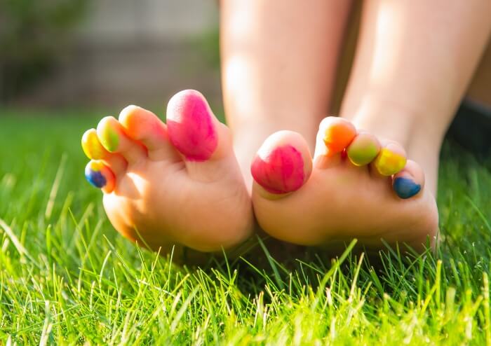 Colored and Happy Feet of a Female