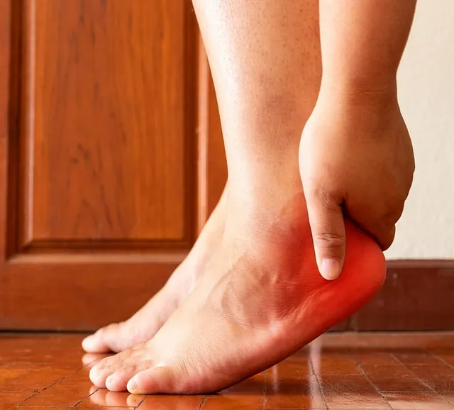 A Woman with Heel Pain Showcasing In Need of Foot Surgery Treatment in Millsboro & Seaford, DE